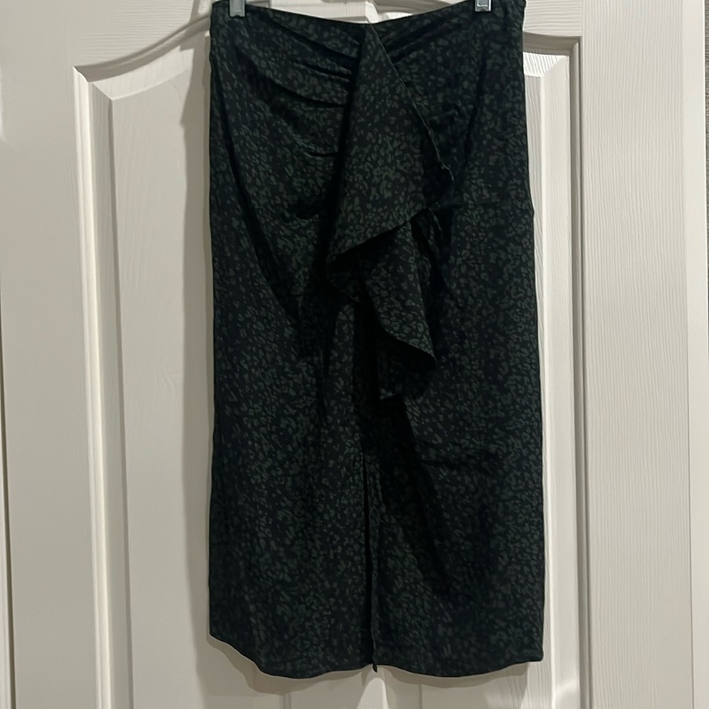 Green and black print midi skirt with front detailing, size small.